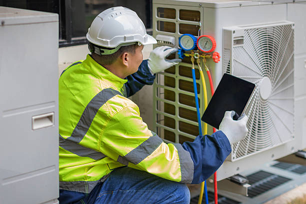 Professional Heat Pump Repair technician working in Barnstable, MA